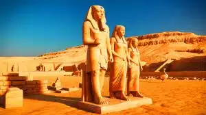 Illustration of the unique Fifth Dynasty funerary statue depicting nobleman Messi with his wife and daughter at Saqqara.