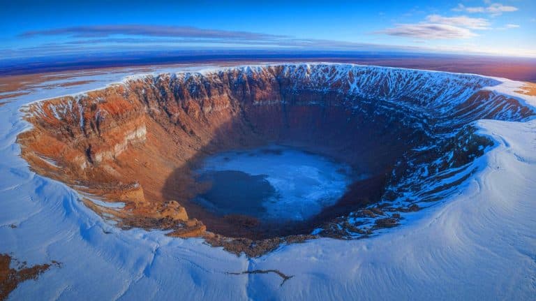 “They’re Exploding From Beneath the Ice”: Scientists Confirm Methane Eruptions Are Behind Siberia’s Massive Craters