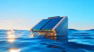 Illustration of a solar desalination device converting seawater into potable water using sunlight.